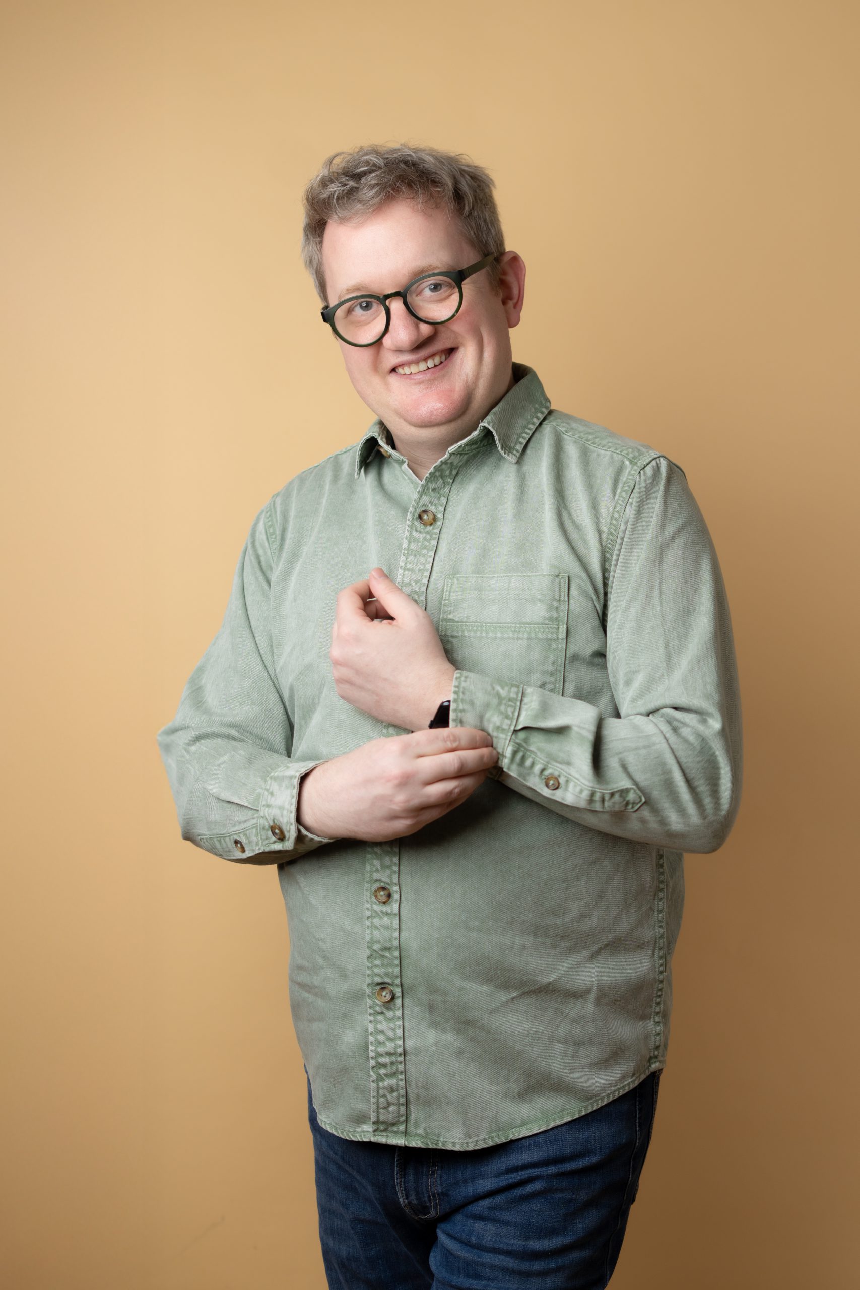 Full-body headshot of Zack, clean shaven